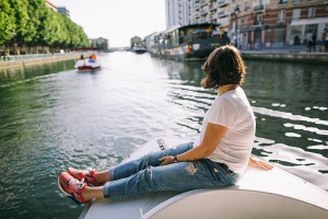 A girl in jaunt on the Canal de l'Ourcq